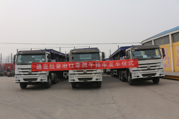 通亞汽車批量倉柵半掛車遠赴大洋彼岸助力非洲建設